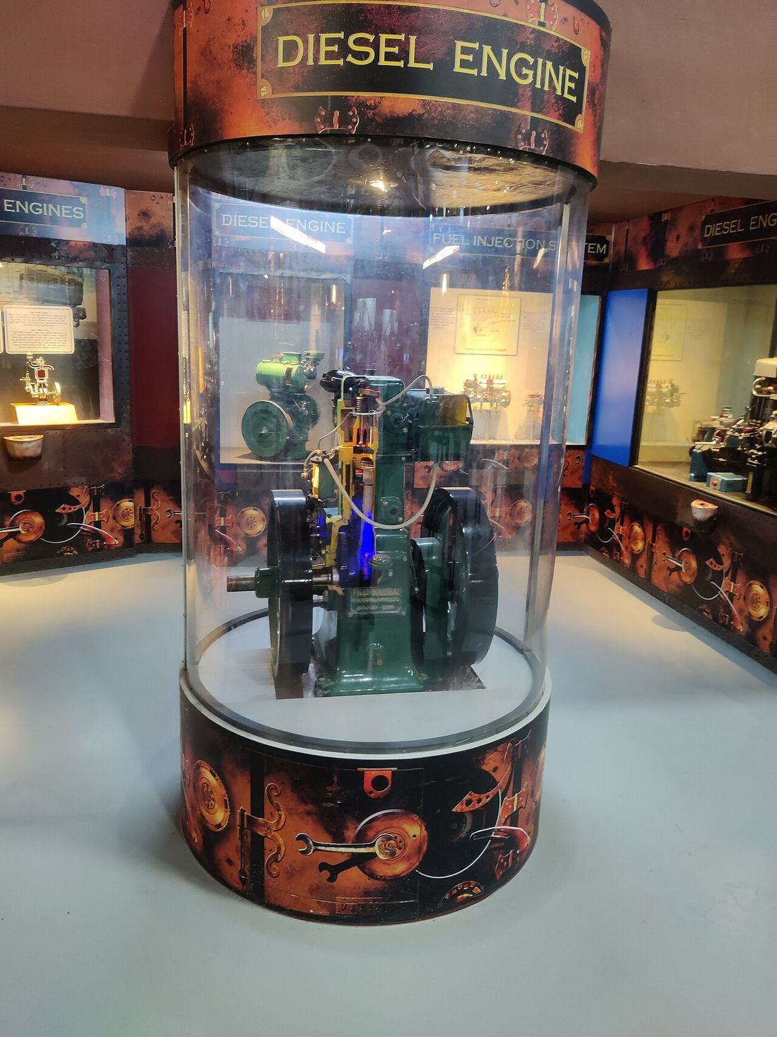 A large vintage diesel engine on museum display