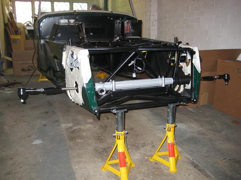 A steering rack and track rods visible underneath a car